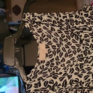 Floral black and white sleeveless blouse